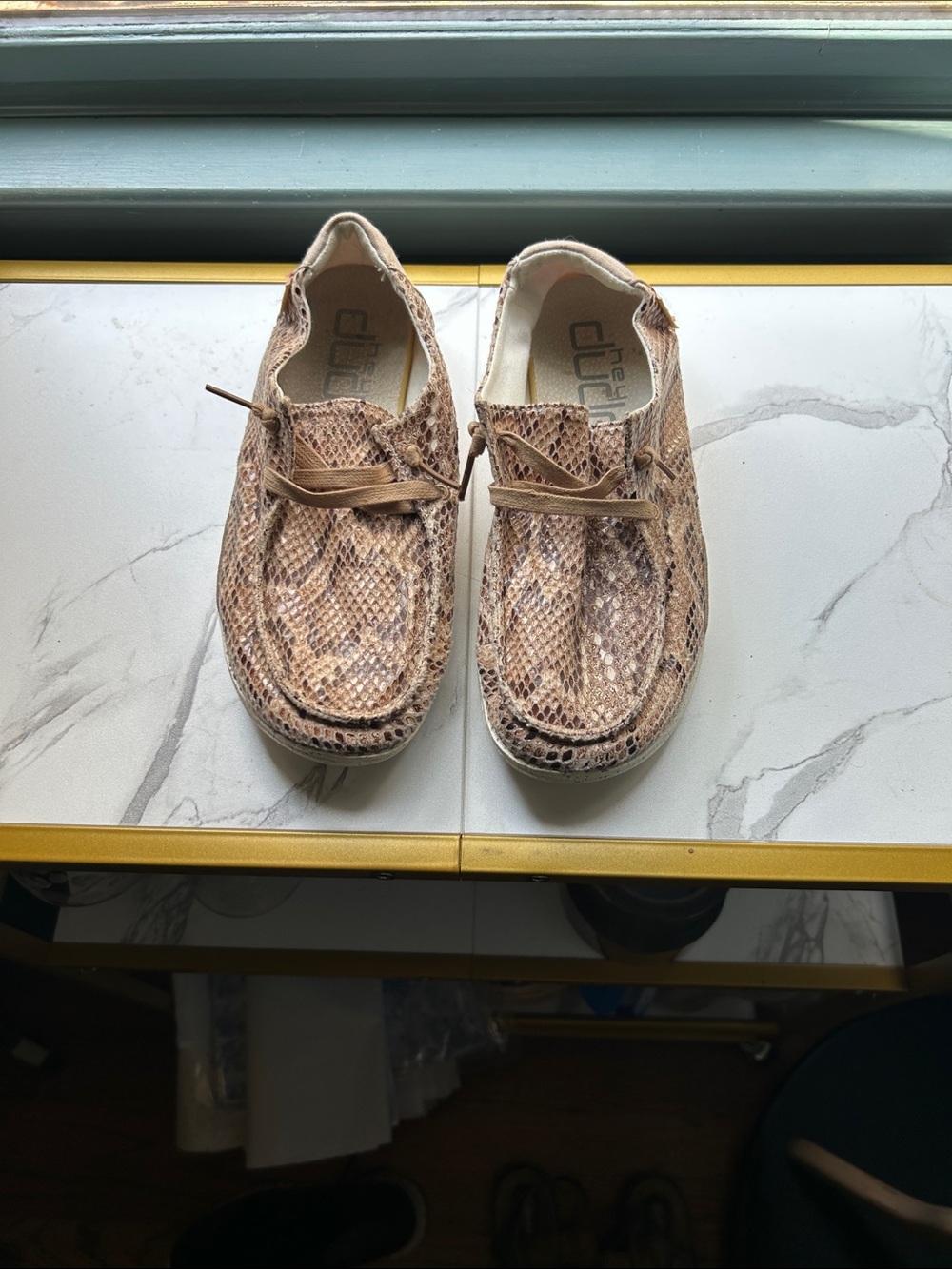 Hey Dude ladies Tan Snake-Print Slip-Ons